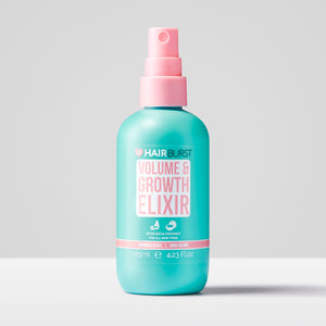Blue bottle of Hairburst Volume & Growth Elixir with pink pump on a light gray background